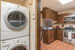 Stackable washer & dryer & kitchen area